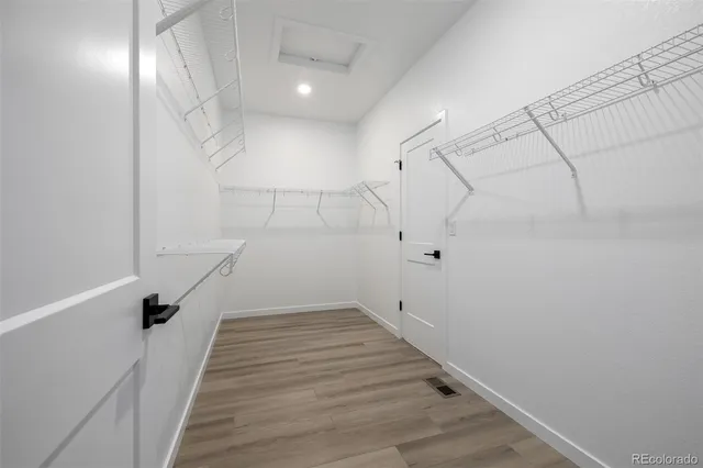 a view of a hallway with stairs