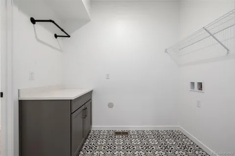 a bathroom with a sink and vanity