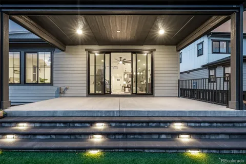 a kitchen with kitchen island a stove and a cabinets