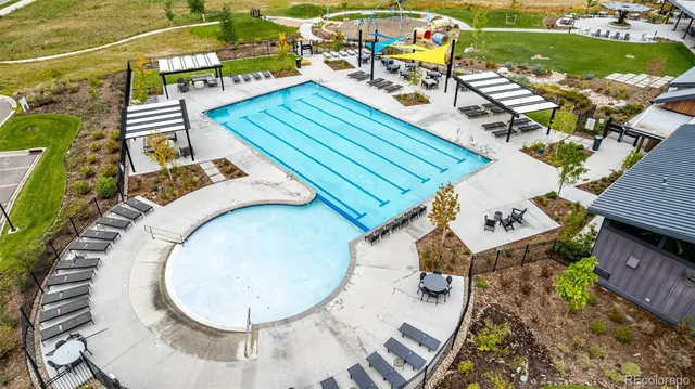 an aerial view of a house with a ocean view