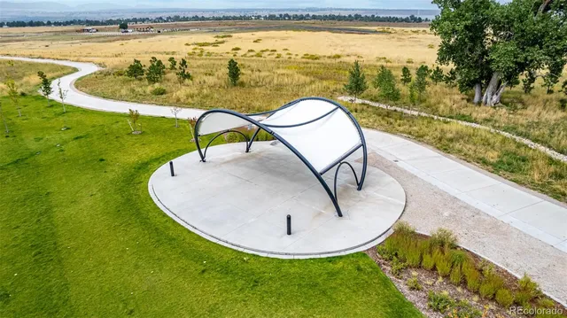 a view of swimming pool from a lake view