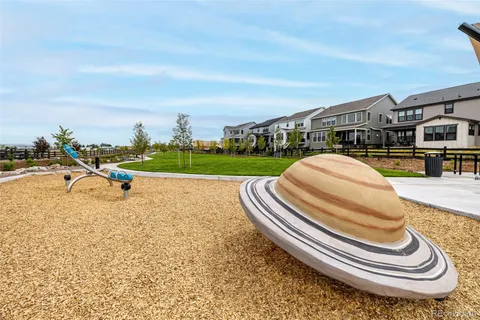 a view of a house with a yard porch and sitting area