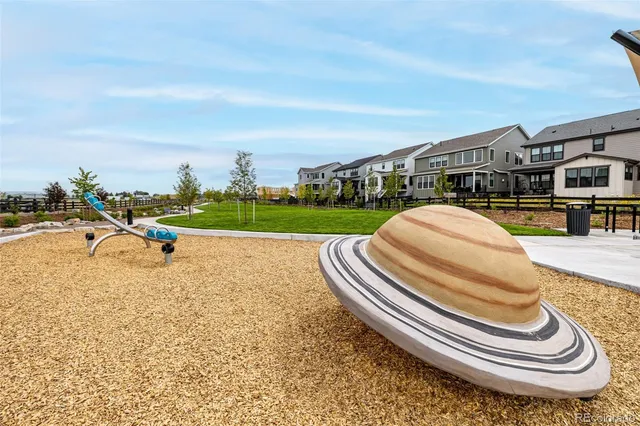 a view of a house with a yard porch and sitting area