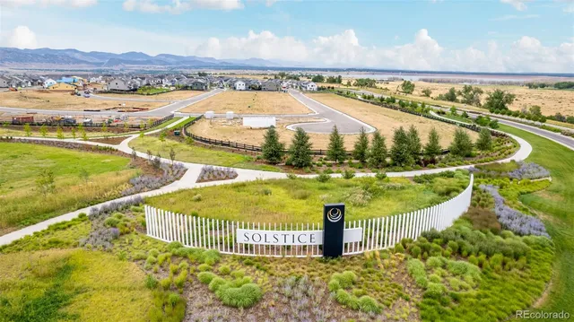 a view of a swimming pool with a lake view