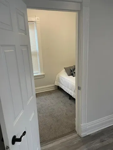 a bedroom with window