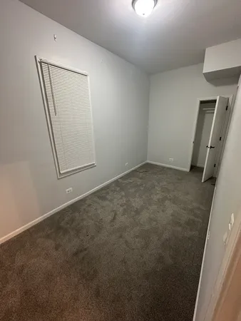 an empty room with mirror