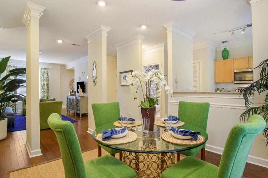 100 Ladson Court, Unit 1007 Decatur, GA 30033 - Photo 4 of 19 a view of a dining room with furniture and wooden floor