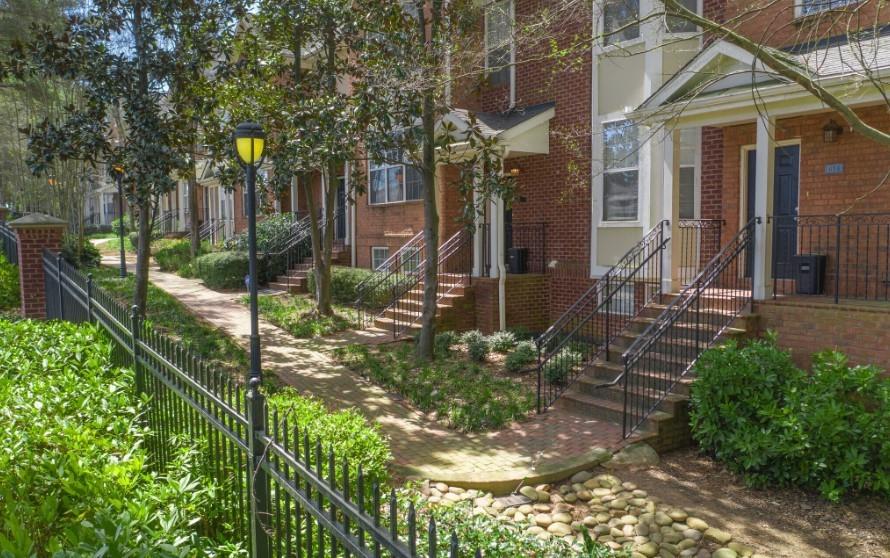 100 Ladson Court, Unit 1007 Decatur, GA 30033 - Photo 10 of 19 a view of a house with a yard and plants