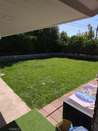 a view of a backyard with a garden