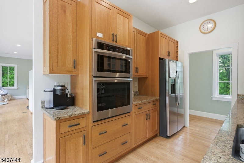 156 Kingsland Road Boonton, NJ 07005 - Photo 11 of 38 a kitchen with stainless steel appliances a stove a microwave and cabinets