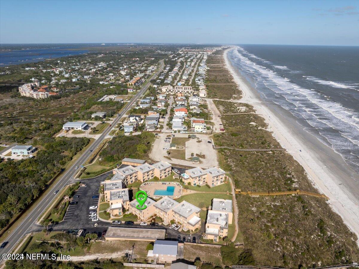 5930 Florida A1A, Unit 8E St. Augustine, FL 32080 - Photo 28 of 31 an aerial view of residential houses with outdoor space