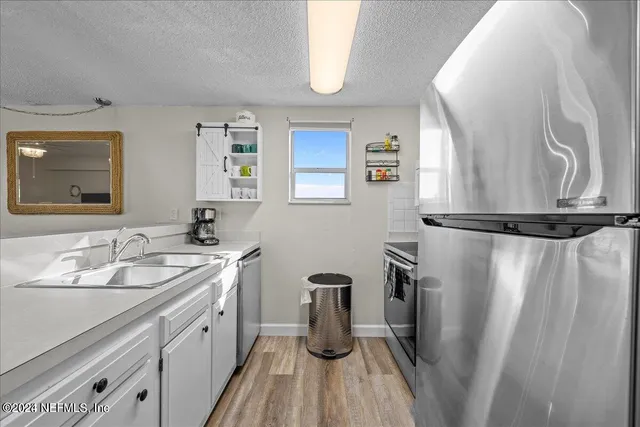 a bathroom with a sink and mirror