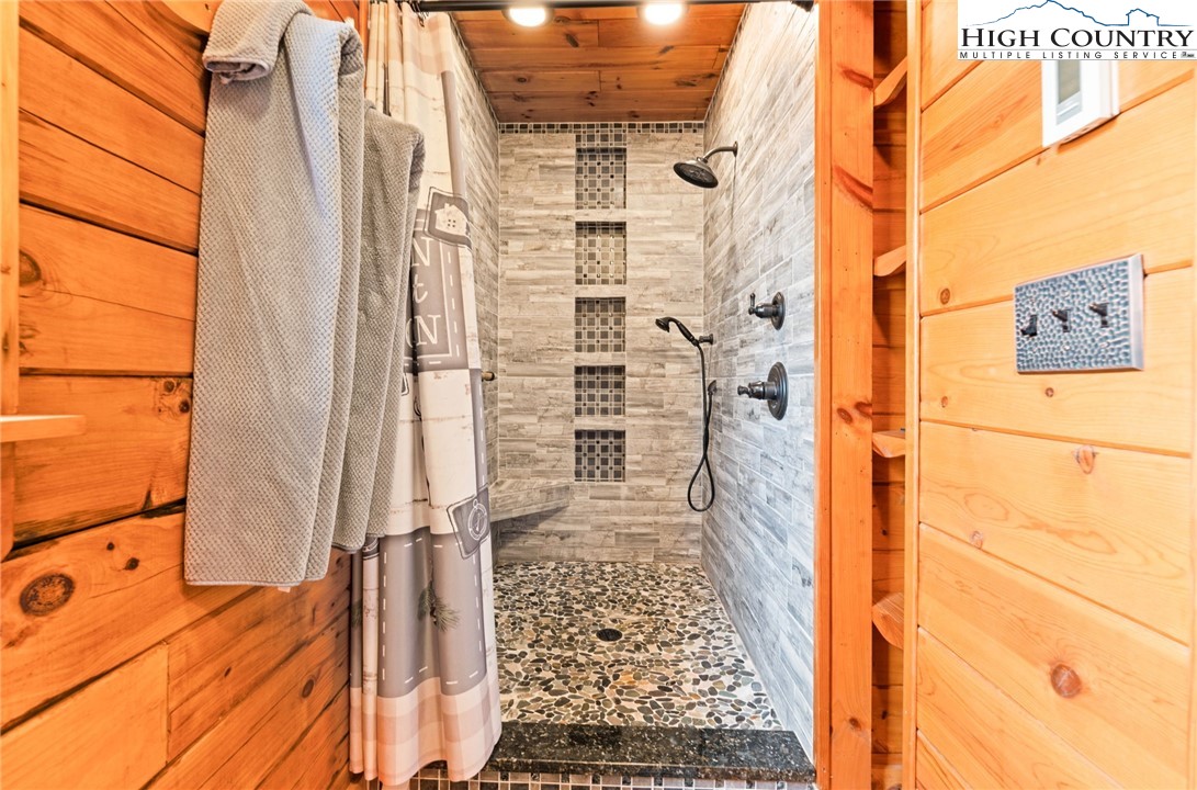 1748 Junaluska Road Boone, NC 28607 - Photo 14 of 37 walk in closet with wooden floor