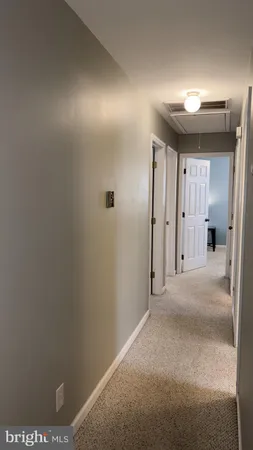 a view of livingroom with hardwood floor and ceiling fan