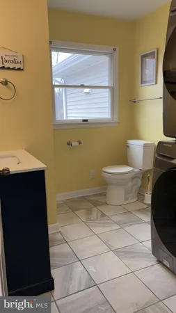 a view of a livingroom and a wooden closet
