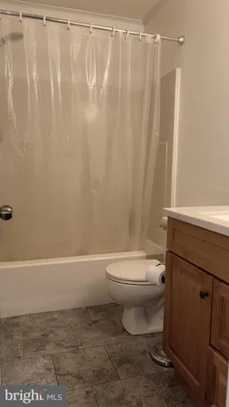 a view of a car park in front of house