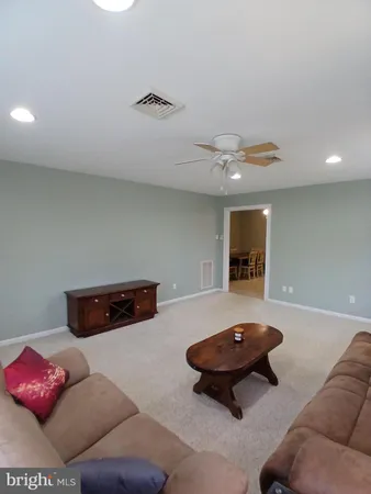 a kitchen with stainless steel appliances granite countertop a sink a stove and a cabinets