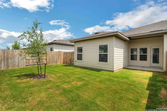 a house view with a garden space