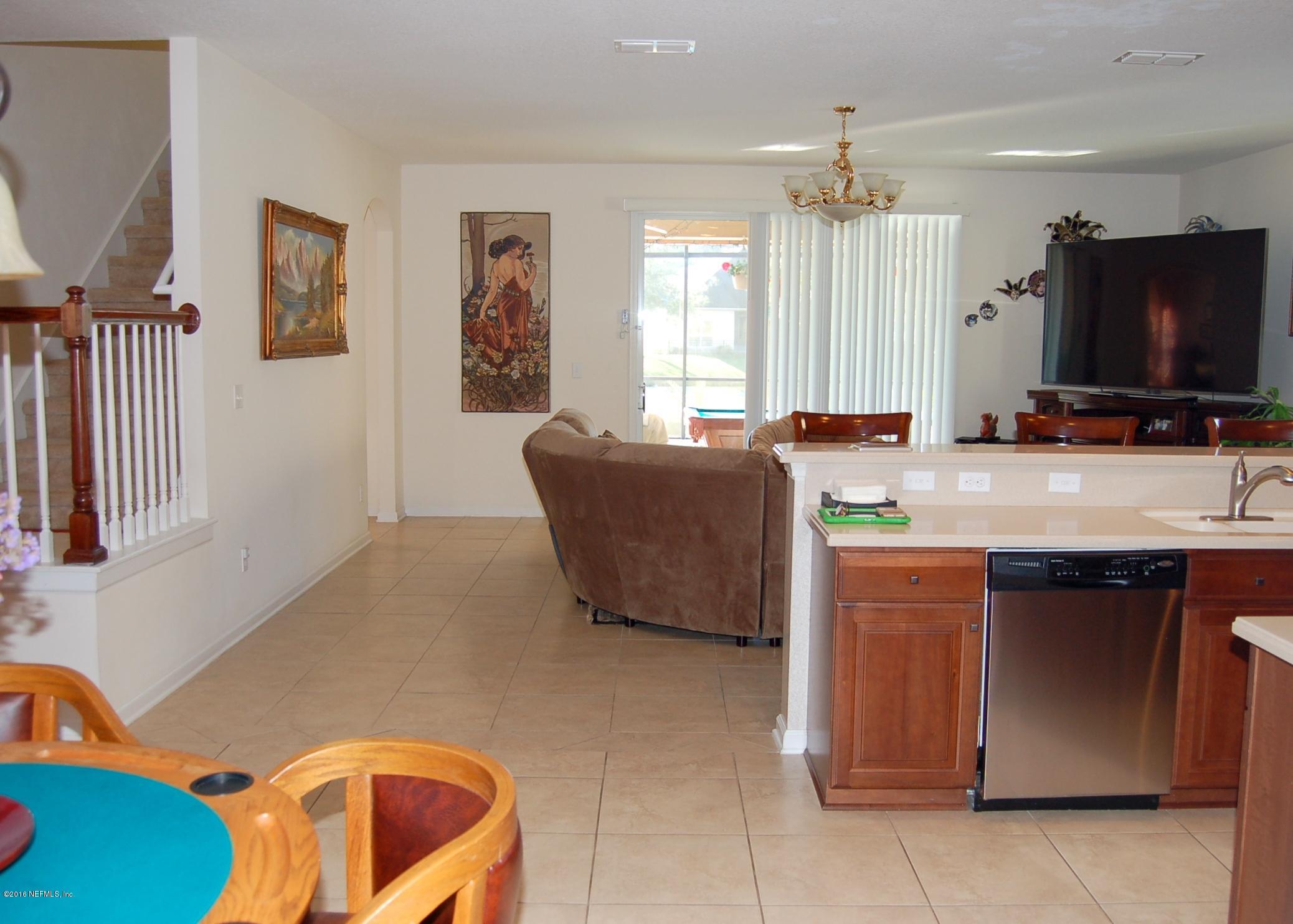390 Porta Rosa Circle St. Augustine, FL 32092 - Photo 12 of 36 Kitchen to family room