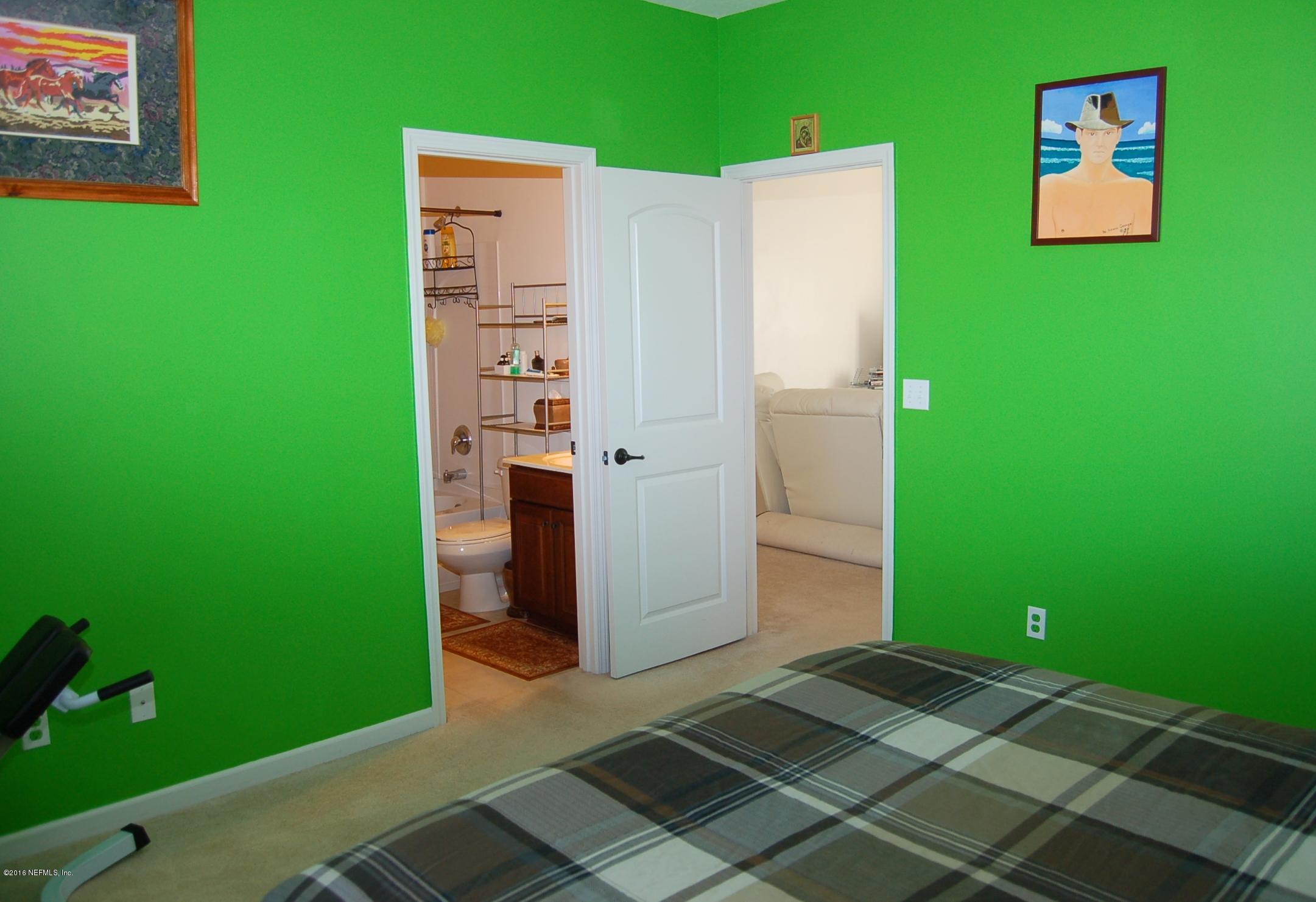 390 Porta Rosa Circle St. Augustine, FL 32092 - Photo 22 of 36 Bedroom 2 to bathroom