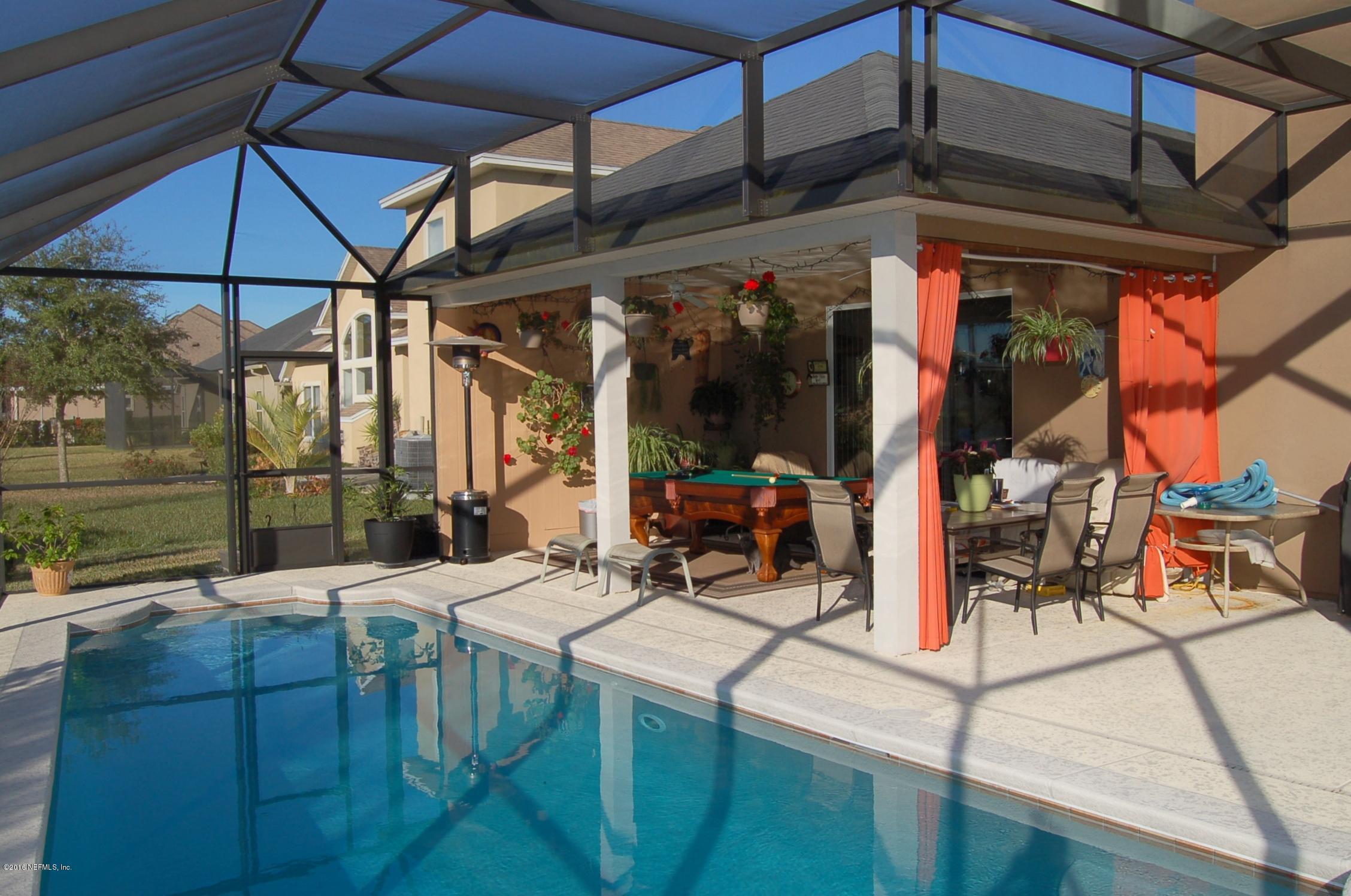390 Porta Rosa Circle St. Augustine, FL 32092 - Photo 26 of 36 Pool and covered patio