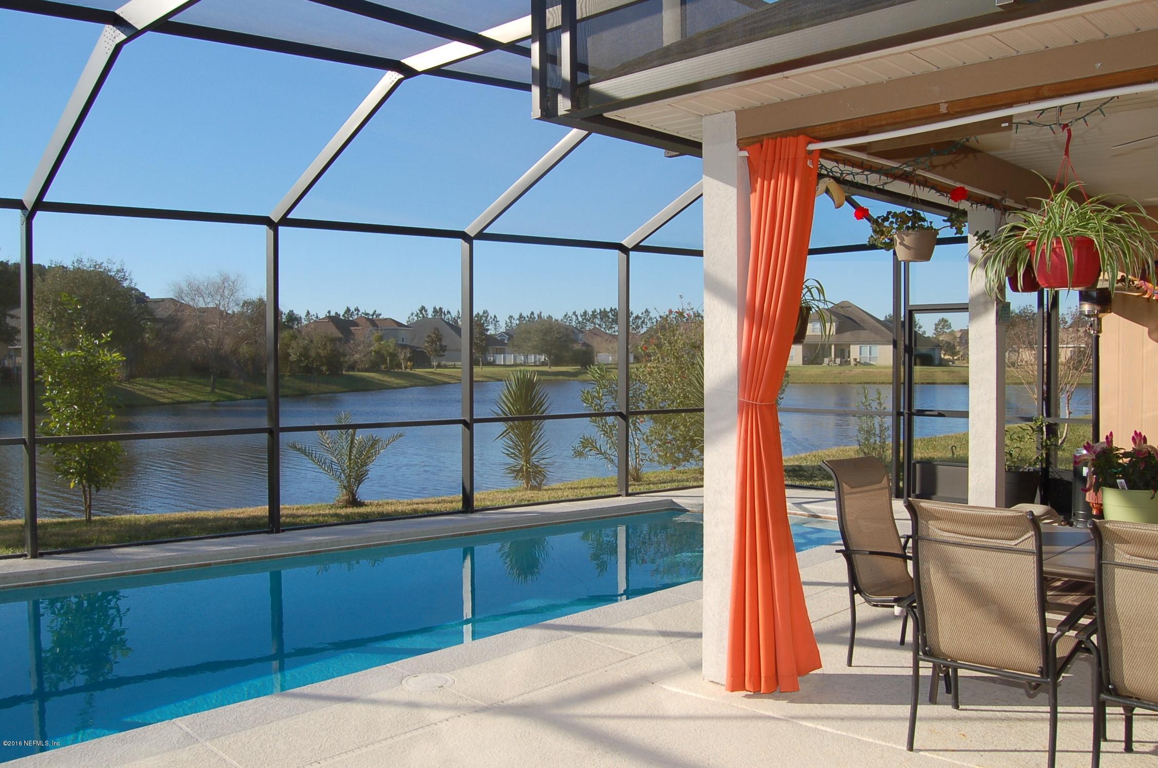 390 Porta Rosa Circle St. Augustine, FL 32092 - Photo 27 of 36 Pool and pond view