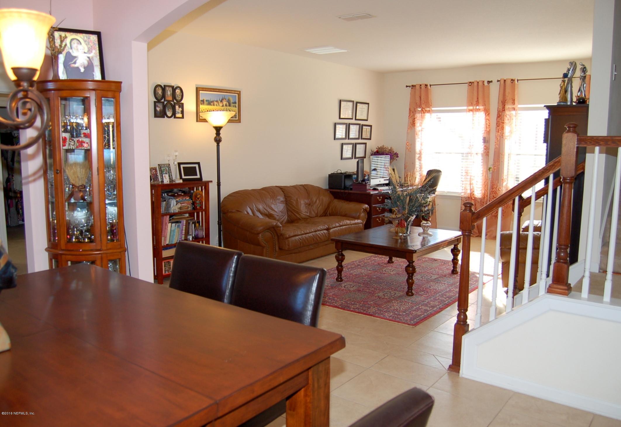 390 Porta Rosa Circle St. Augustine, FL 32092 - Photo 7 of 36 Dining room to living room