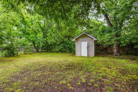 a house with a tree in front of it