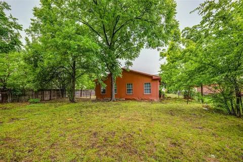 a house view with a outdoor space