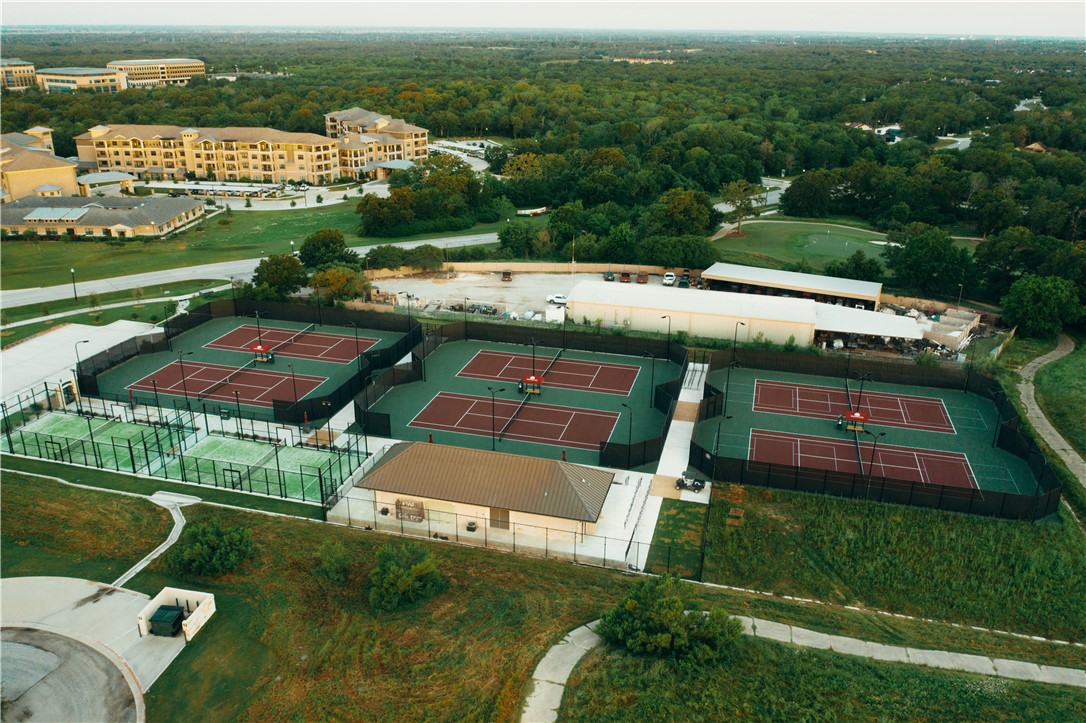 3325 Stephan's Crossing Bryan, TX 77807 - Photo 11 of 13 an aerial view of a house with a garden and lake view