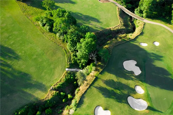 a front view of a house with swimming pool