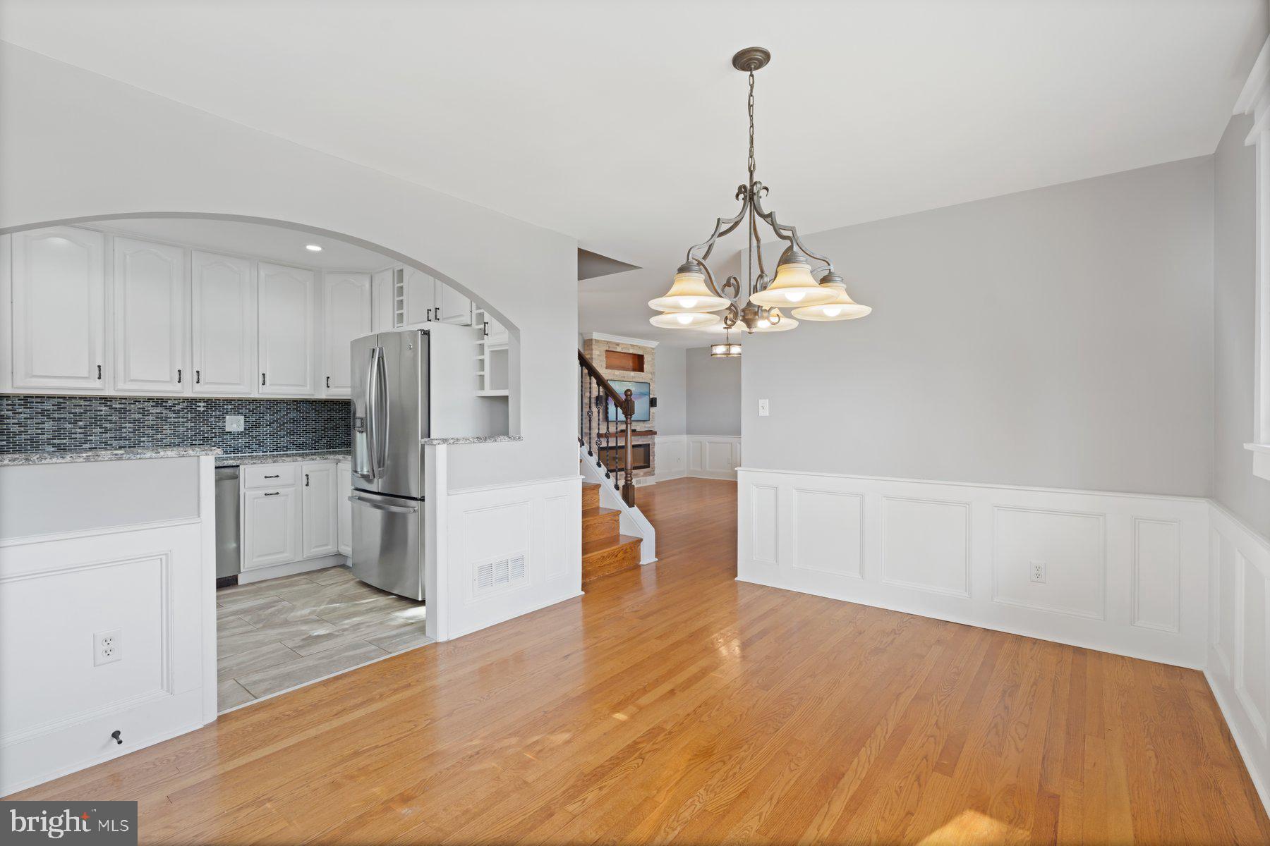 27 Edgemoor Road Lutherville-Timonium, MD 21093 - Photo 5 of 42 a view of a kitchen with a sink and refrigerator
