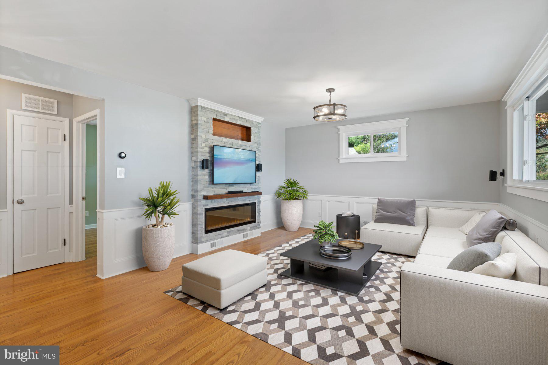 27 Edgemoor Road Lutherville-Timonium, MD 21093 - Photo 9 of 42 a living room with furniture and a wooden floor