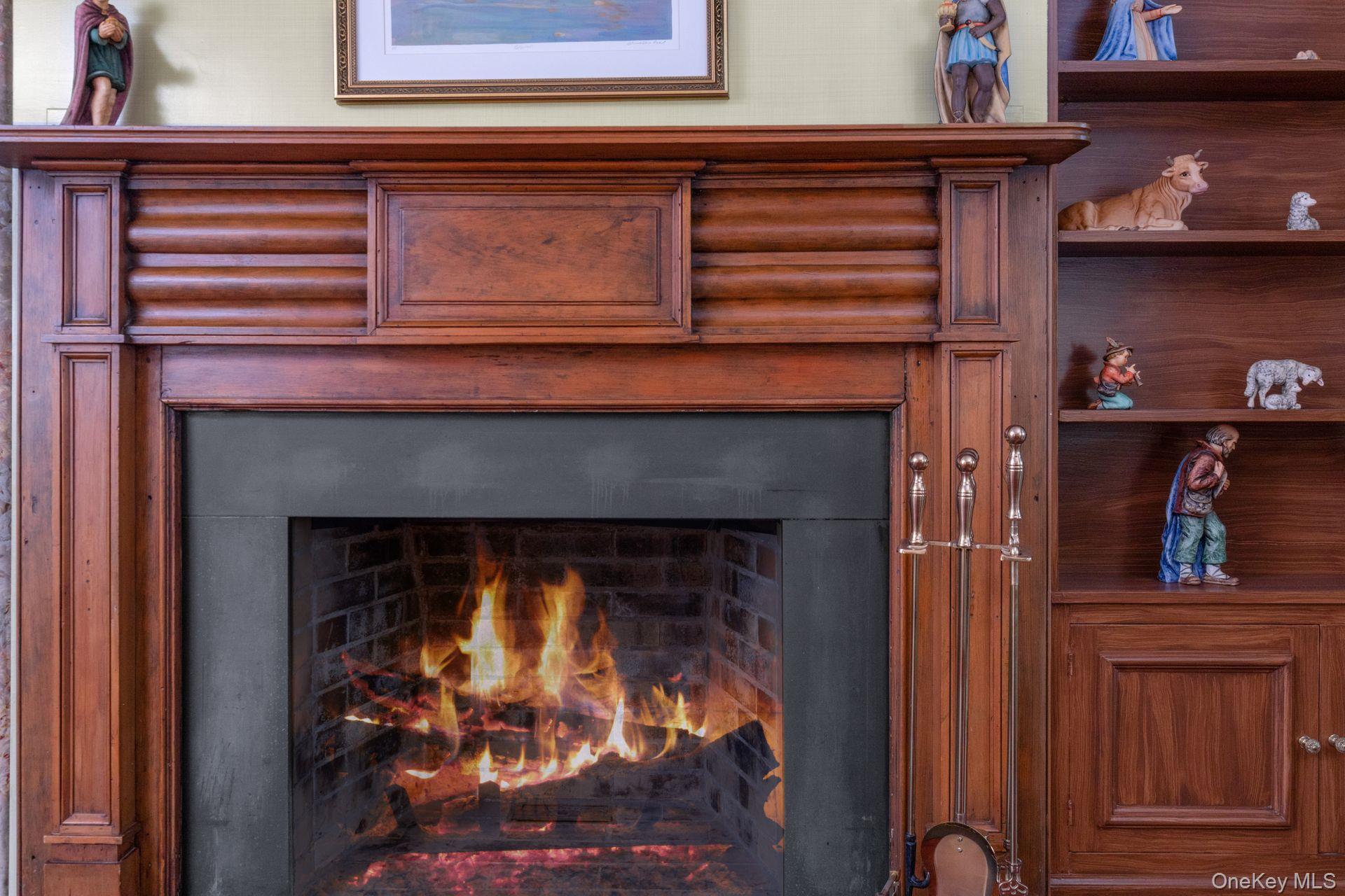 235 Bear Ridge Road Pleasantville, NY 10570 - Photo 13 of 24 Detailed view of a warm lit fireplace