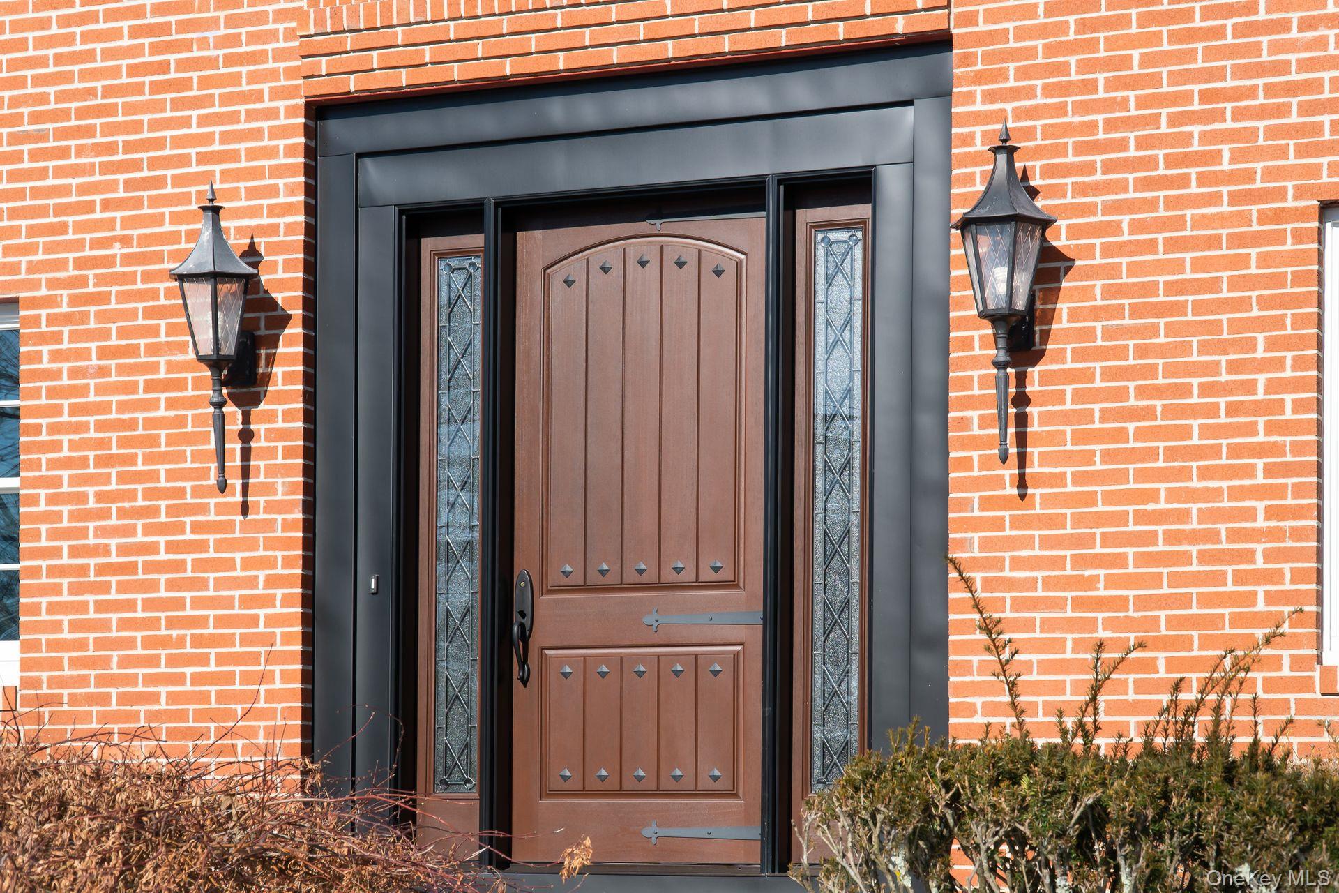 235 Bear Ridge Road Pleasantville, NY 10570 - Photo 9 of 24 Doorway to property featuring brick siding
