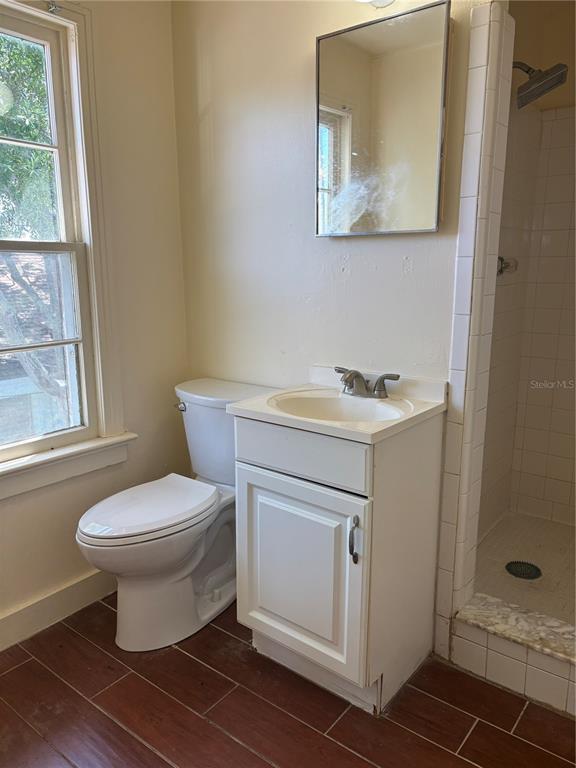 507 Cleveland Avenue Southwest, Unit 2 Largo, FL 33770 - Photo 14 of 20 a bathroom with a sink toilet and shower
