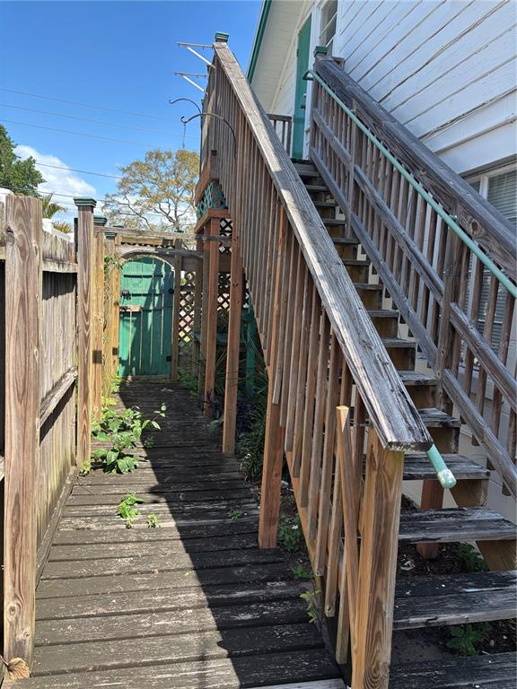 507 Cleveland Avenue Southwest, Unit 2 Largo, FL 33770 - Photo 16 of 20 a view of a house with wooden floor and stairs