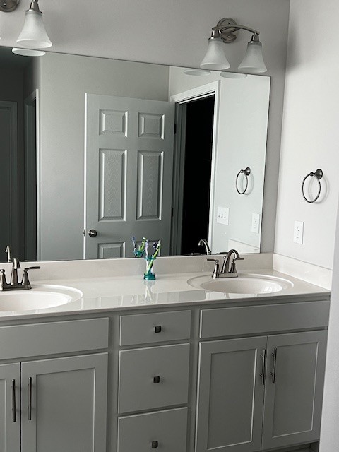 3726 Elene Way Murfreesboro, TN 37129 - Photo 3 of 9 a bathroom with a double vanity sink and a mirror