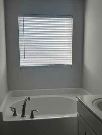 a bathroom with a bathtub