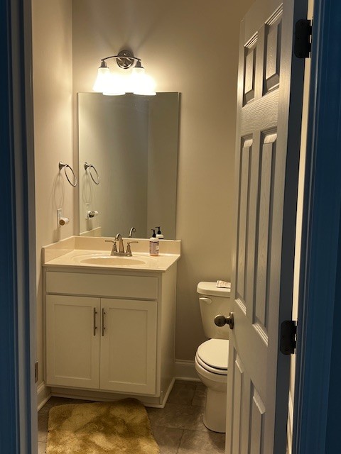 3726 Elene Way Murfreesboro, TN 37129 - Photo 5 of 9 a bathroom with a toilet a sink and mirror