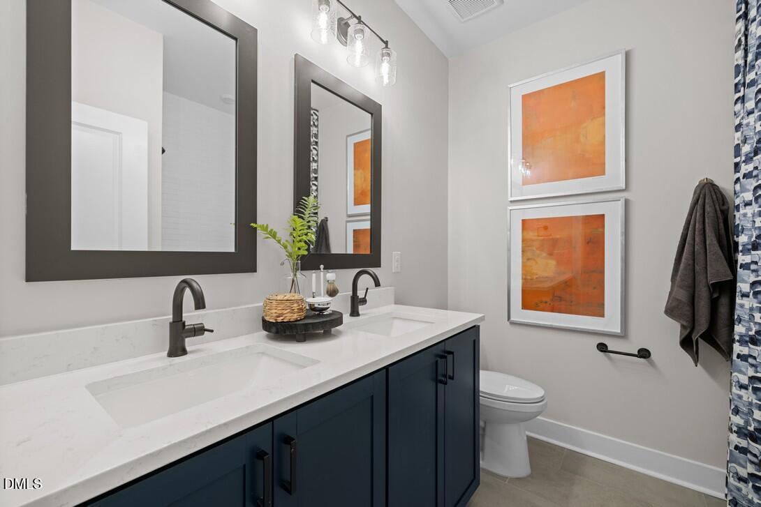 4705 Mint Leaf Lane Raleigh, NC 27612 - Photo 32 of 40 Elm Park 47_Bathroom 1_6.24.24_Model_web