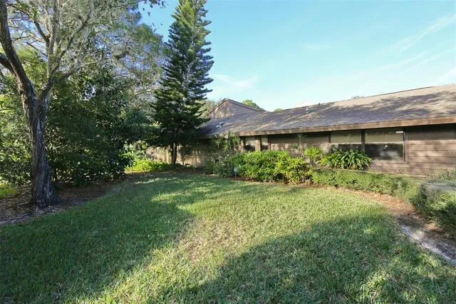 a view of a house with a garden