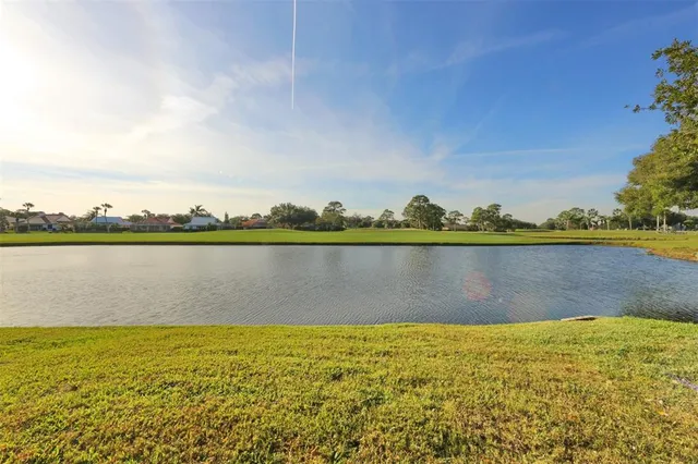 a view of a lake with a big yard