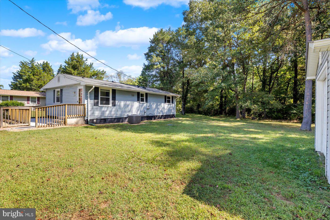 11193 Henry Griffin Road King George, VA 22485 - Photo 11 of 35 a view of a house with a backyard