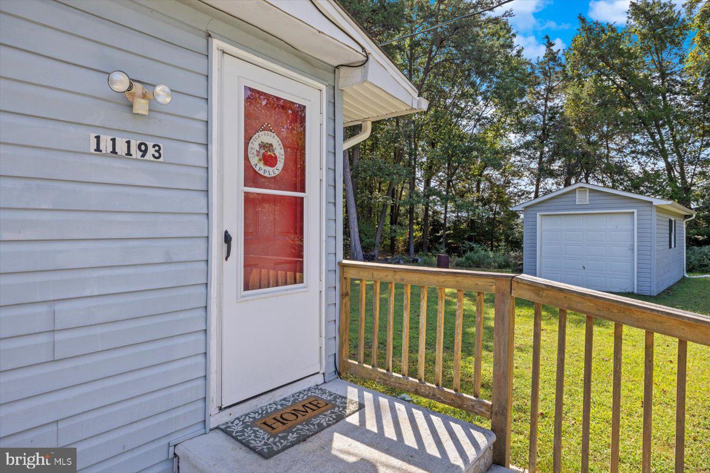 11193 Henry Griffin Road King George, VA 22485 - Photo 13 of 35 a view of a street with door and wooden floor