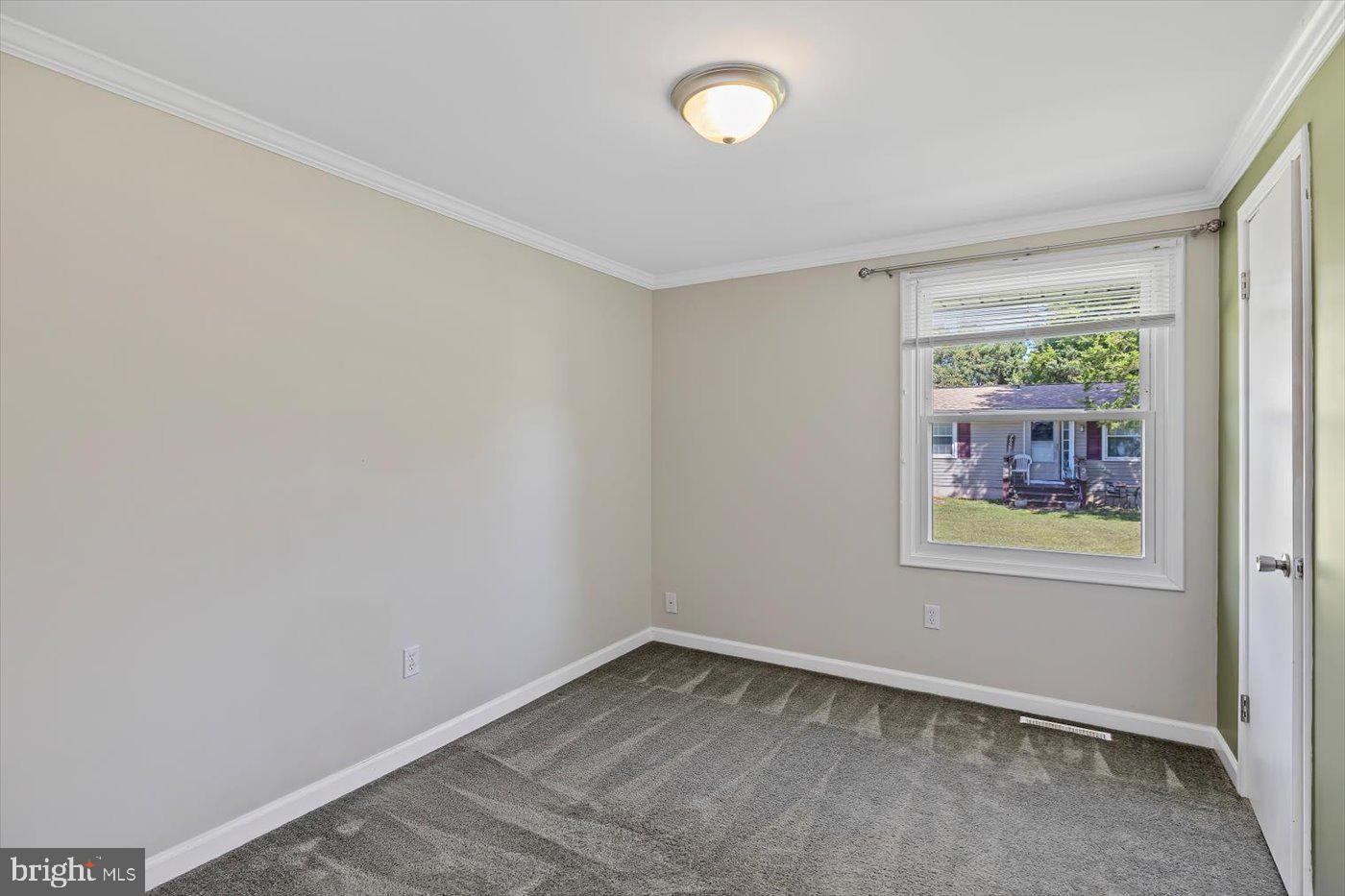11193 Henry Griffin Road King George, VA 22485 - Photo 23 of 35 an empty room with a window