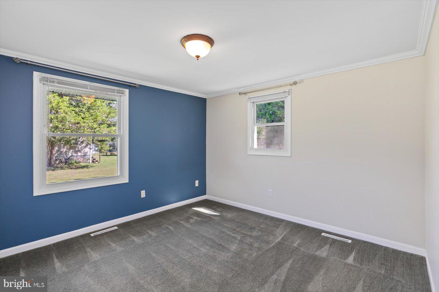 11193 Henry Griffin Road King George, VA 22485 - Photo 24 of 35 an empty room with windows