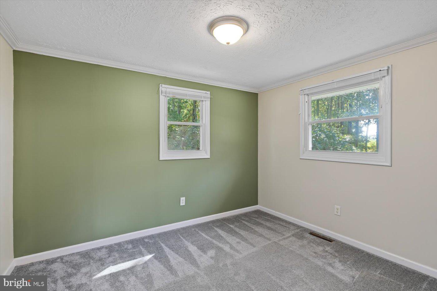 11193 Henry Griffin Road King George, VA 22485 - Photo 25 of 35 a view of room with window and stairs