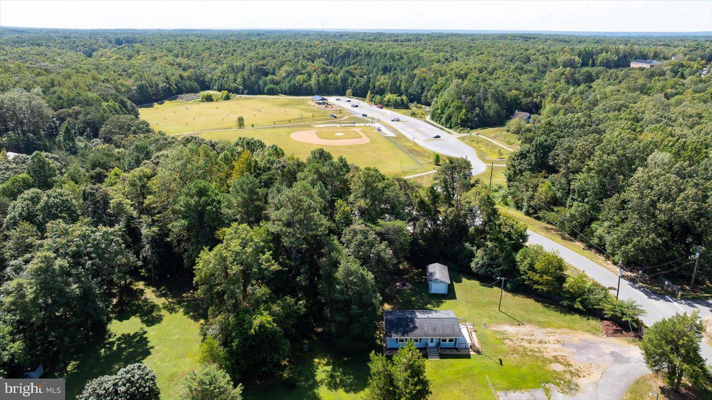11193 Henry Griffin Road King George, VA 22485 - Photo 27 of 35 a view of a swimming pool with a yard
