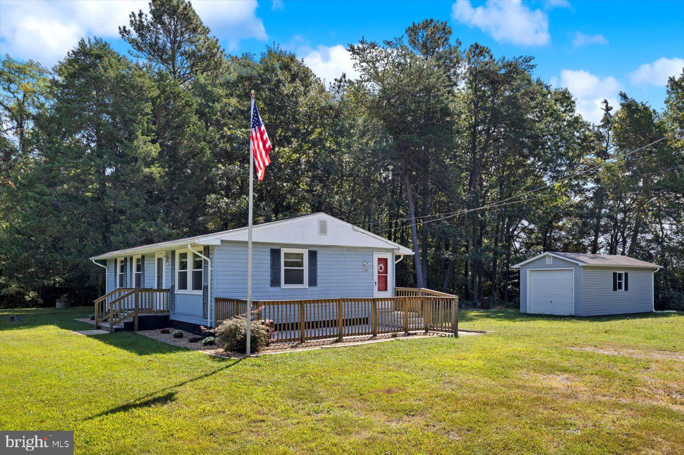 11193 Henry Griffin Road King George, VA 22485 - Photo 4 of 35 a house view with a sitting space and garden